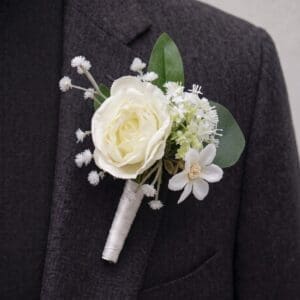 Avoca artificial groomsmen buttonhole for wedding flower hire in the UK.